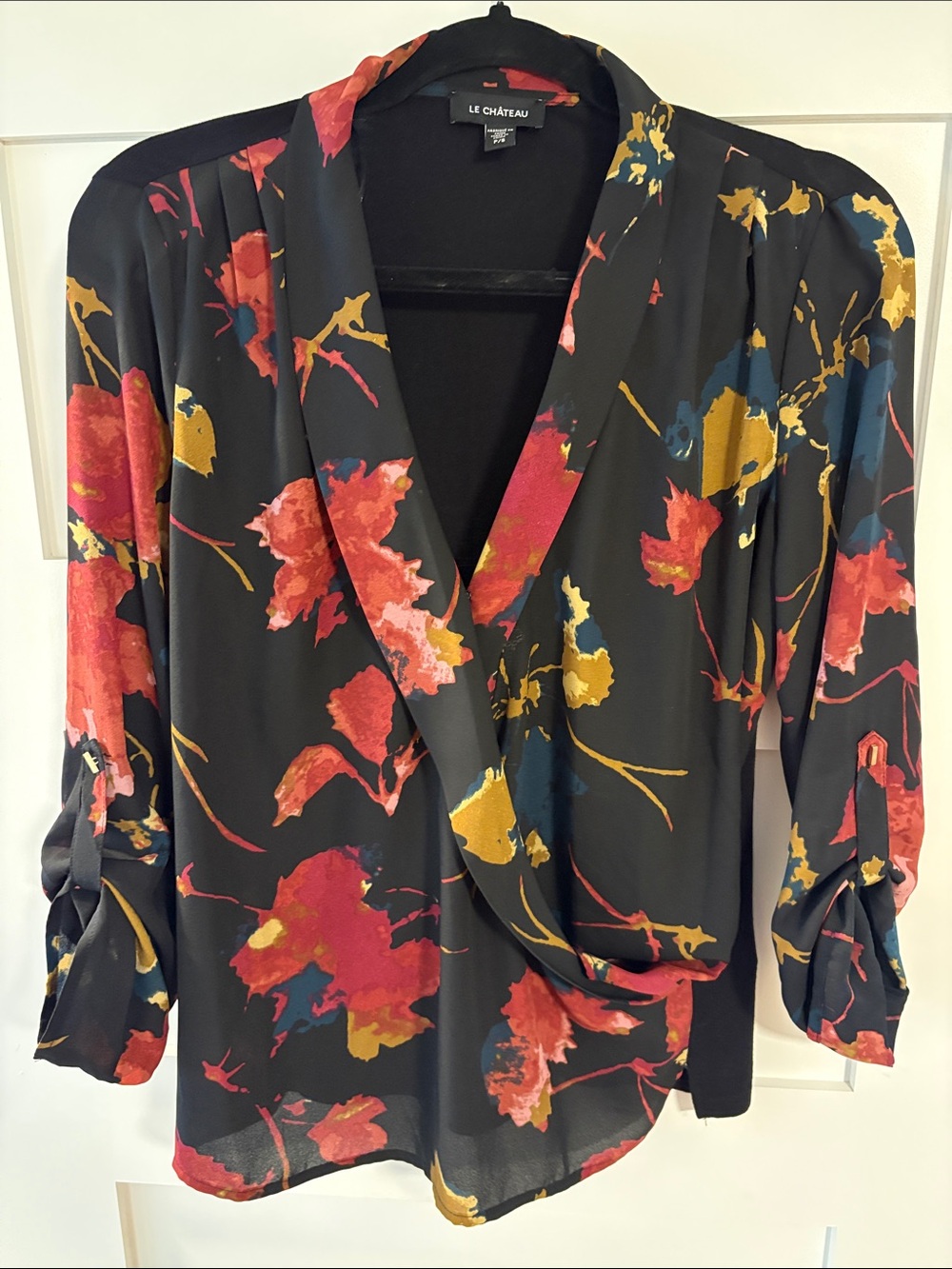 le chateau Black Floral Wrap Blouse - Red, Gold & Blue Accents